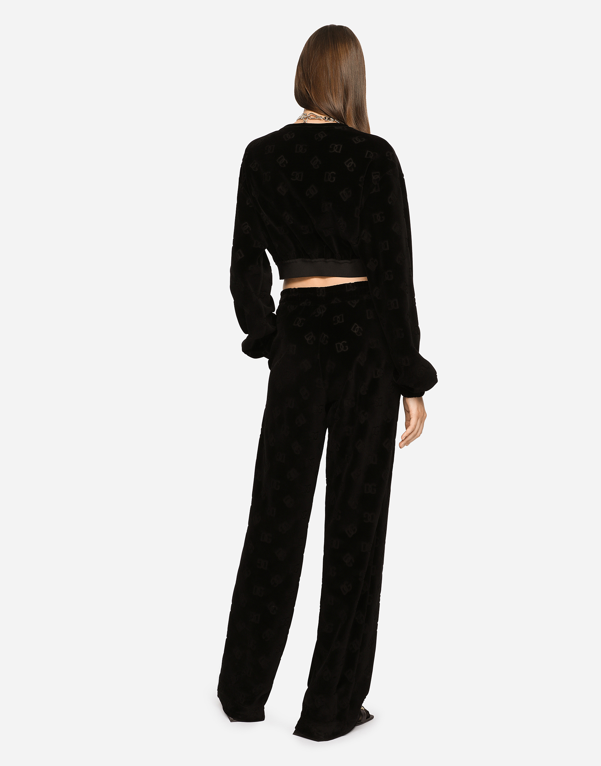 Dolce & Gabbana Flocked Jersey Pants With All-over Dg Logo In Black