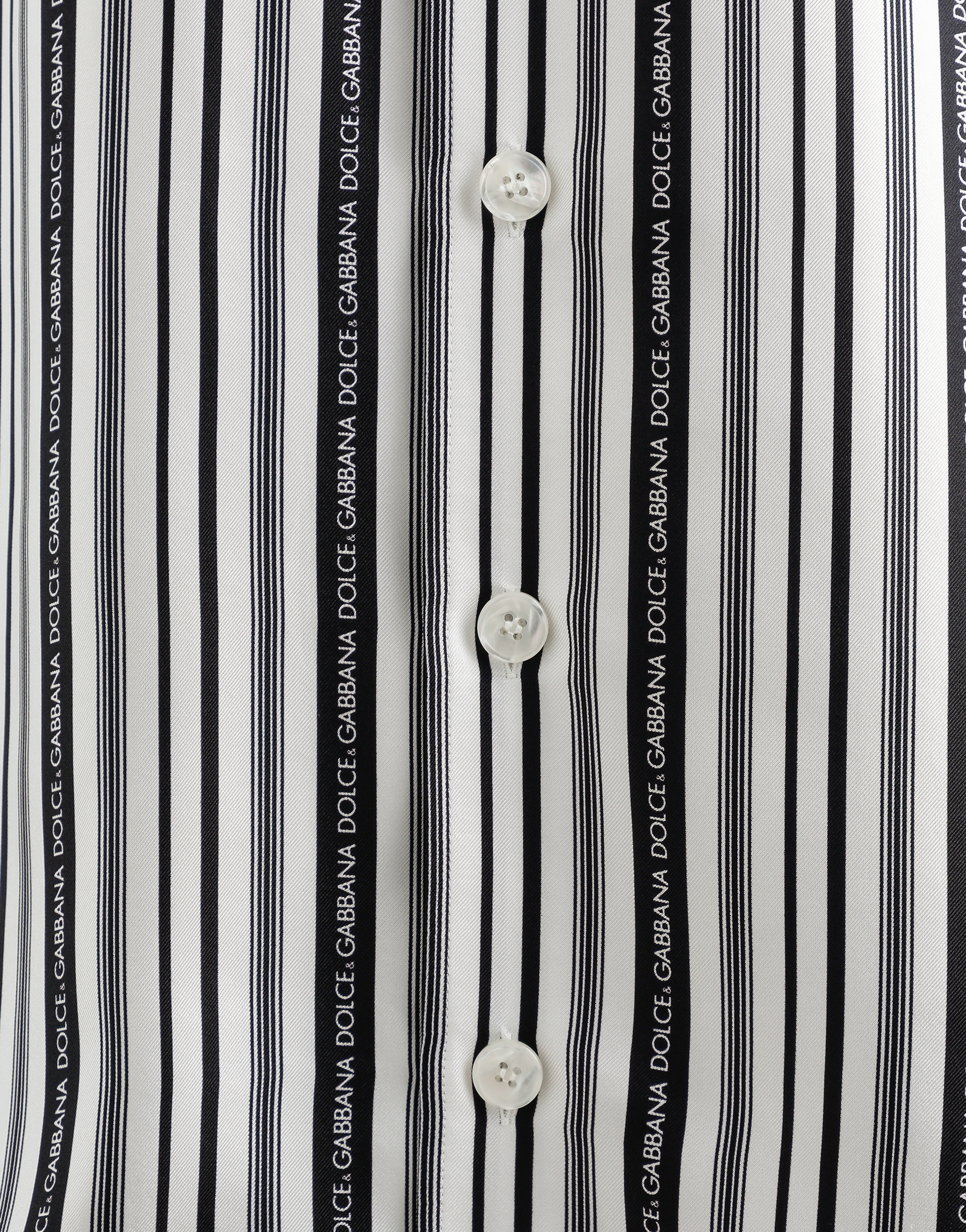 Silk shirt with tie print