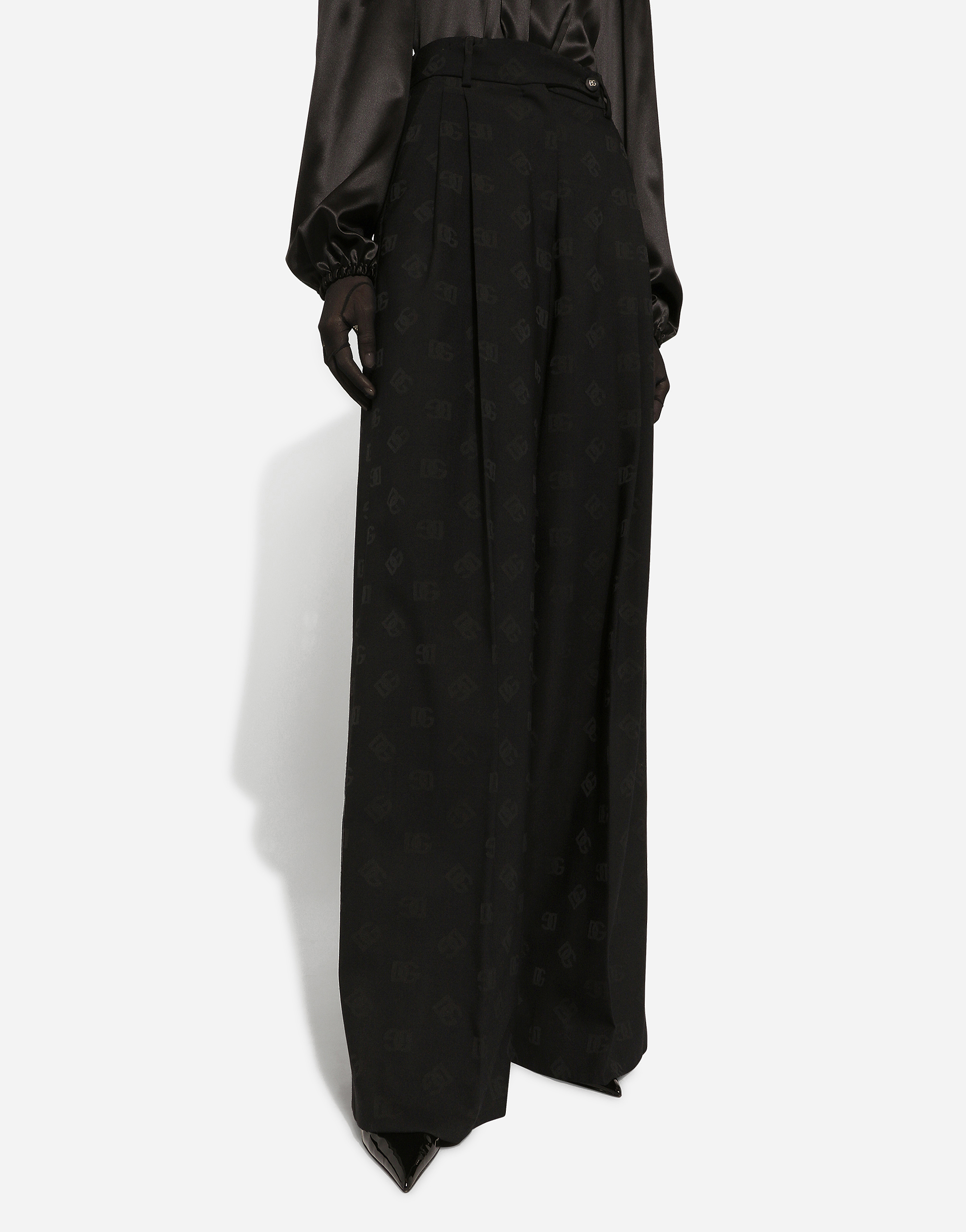 Shop Dolce & Gabbana Flared Wool Jacquard Pants With Dg Logo In Black