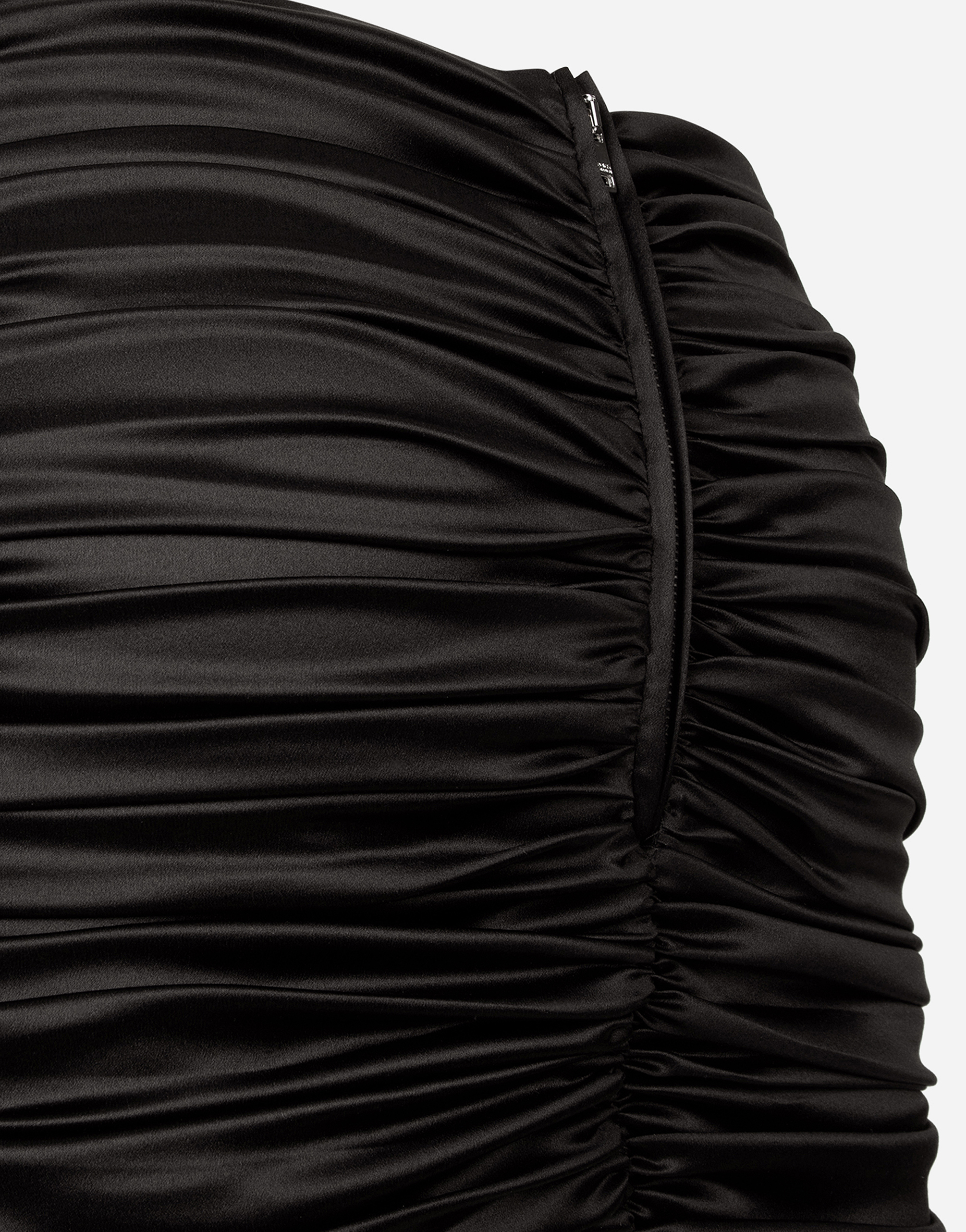 Short draped satin skirt with side bow