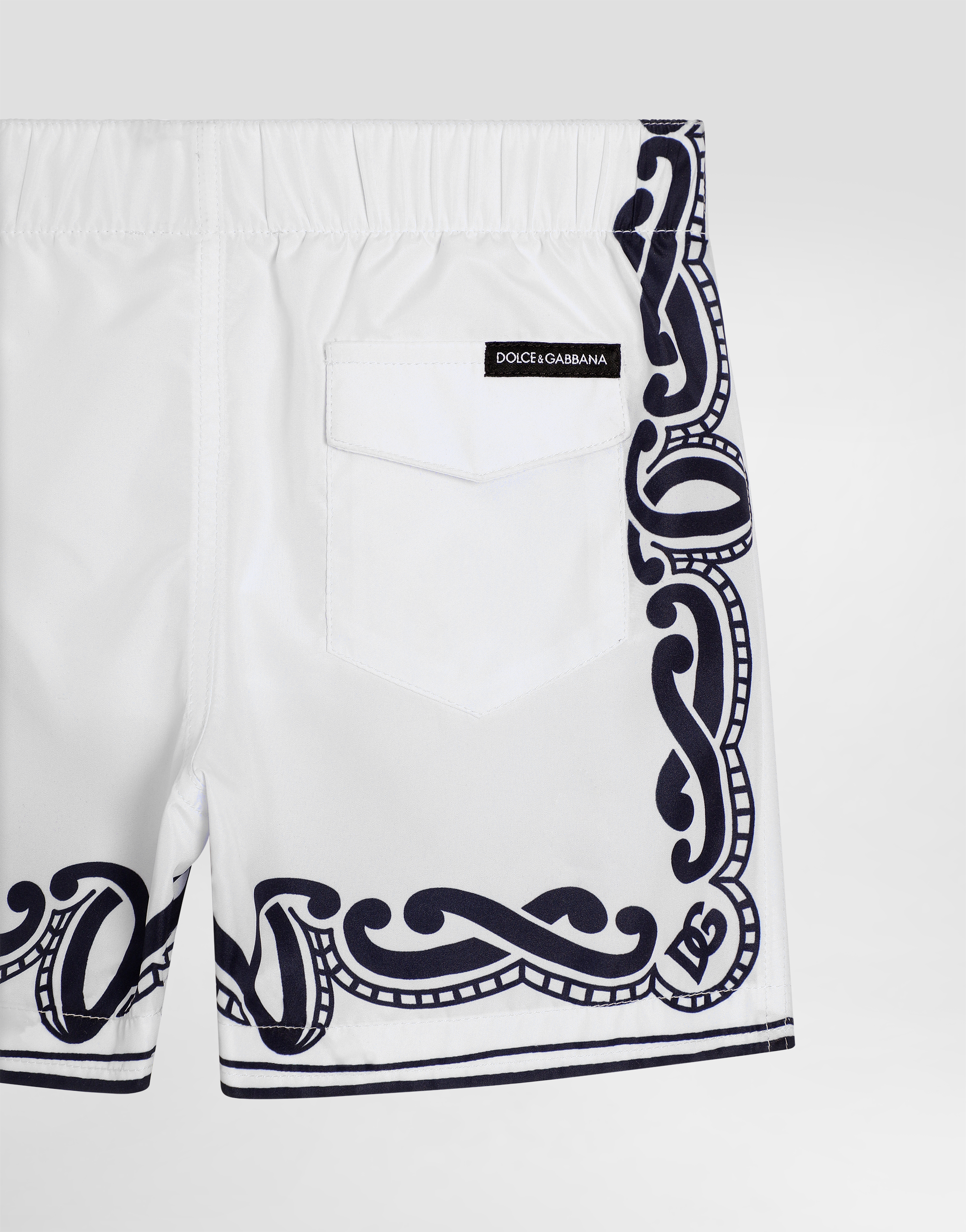 Fabric swim trunks with bandanna print