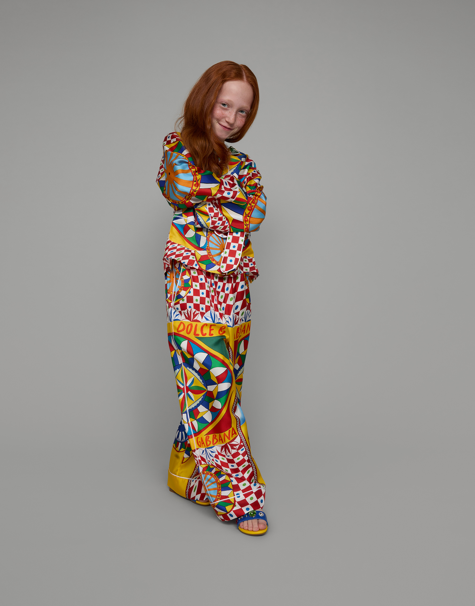 DOLCE & GABBANA CARRETTO-PRINT TWILL PANTS WITH CONTRASTING PIPING