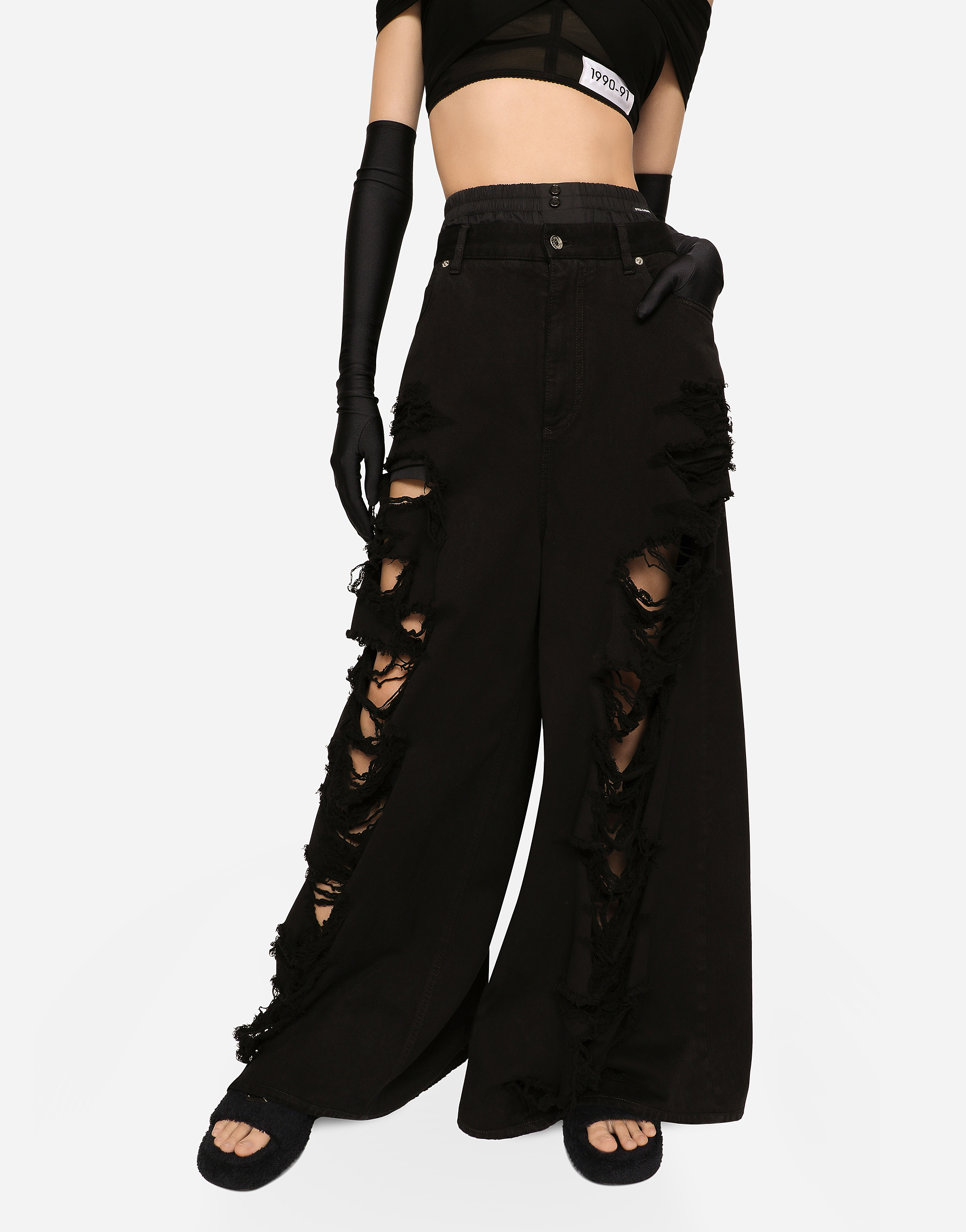 DOLCE & GABBANA FLARED JEANS WITH RIPPED DETAILS