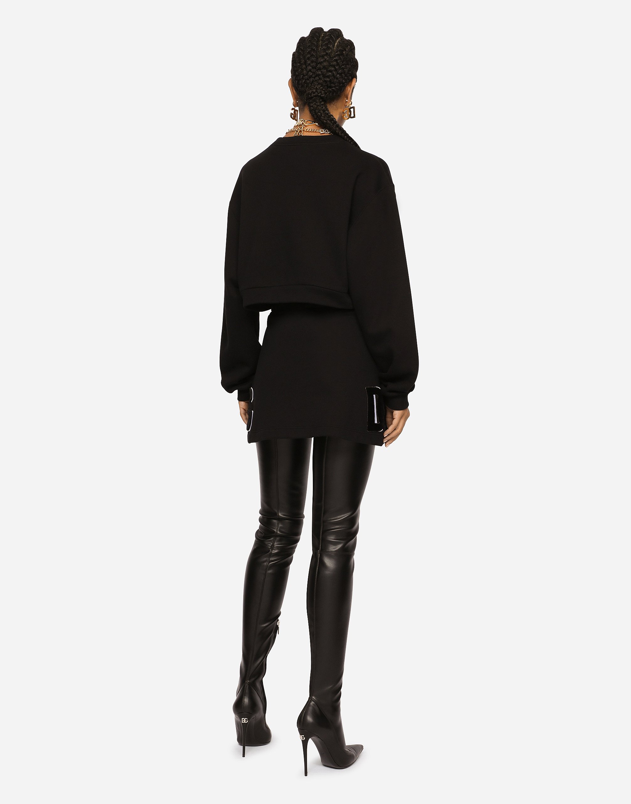 Dolce & Gabbana Jersey Miniskirt With Logo Patch In Black