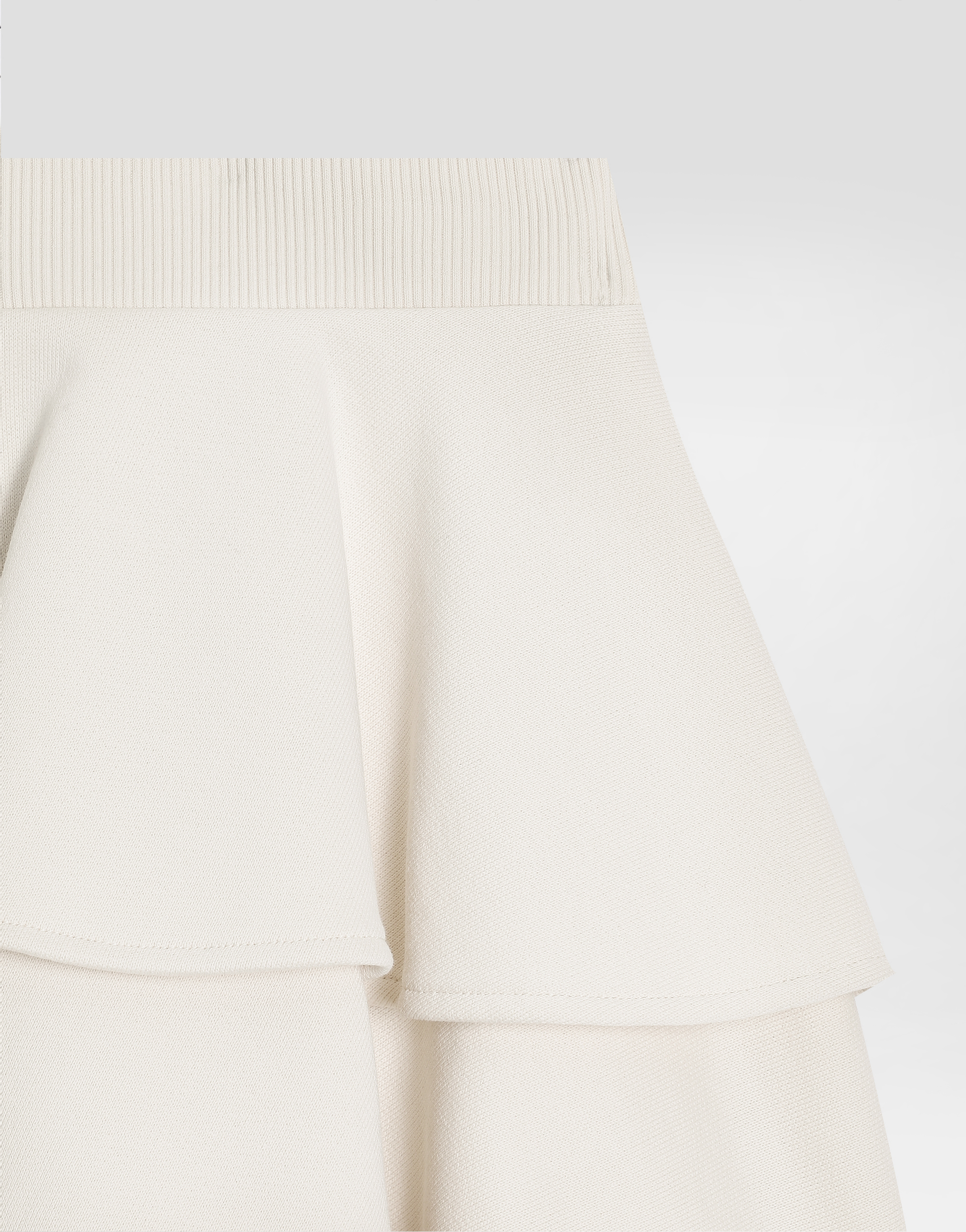 Fleece skirt with laser-cut DG logo