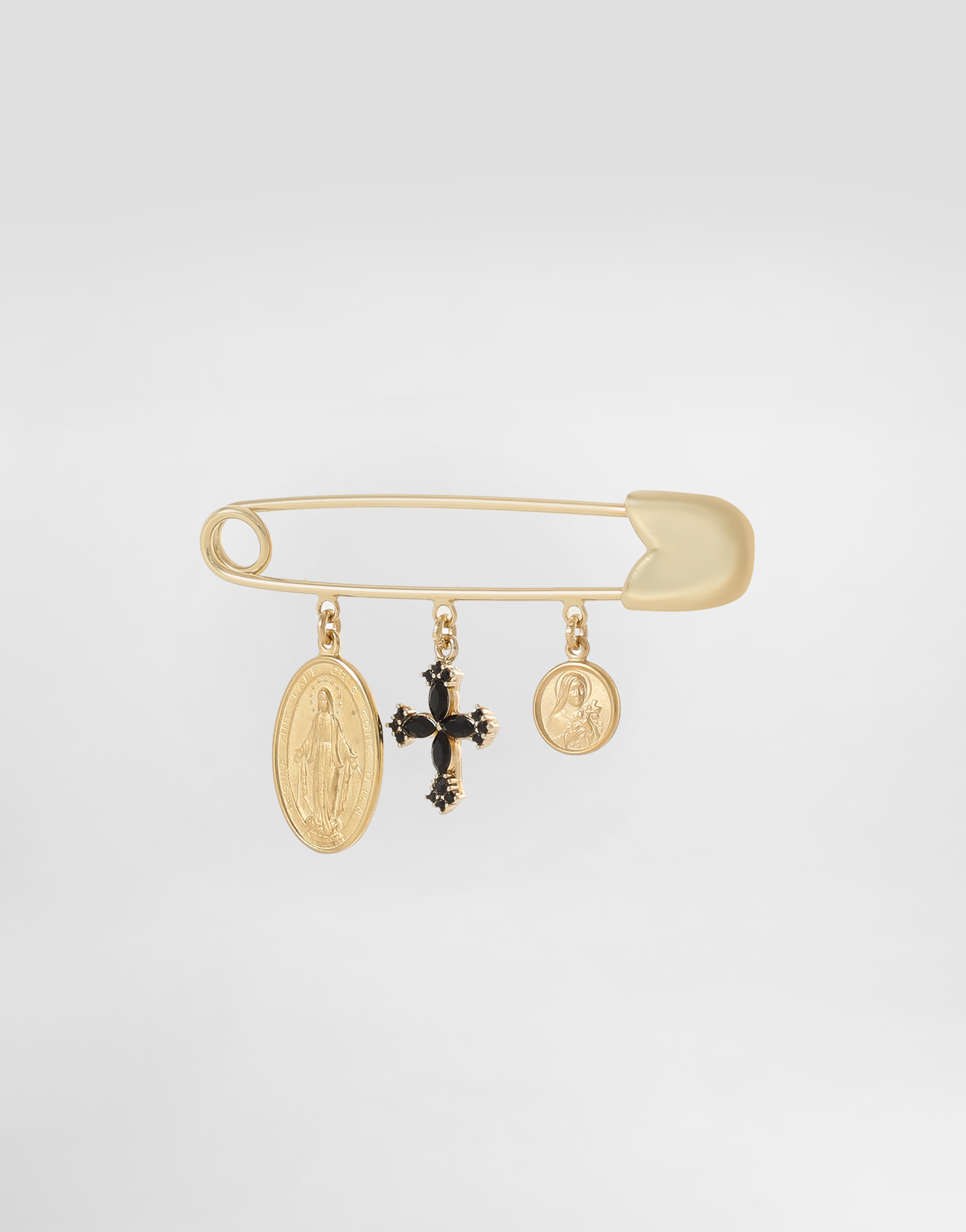 Safety brooch with cross and medals