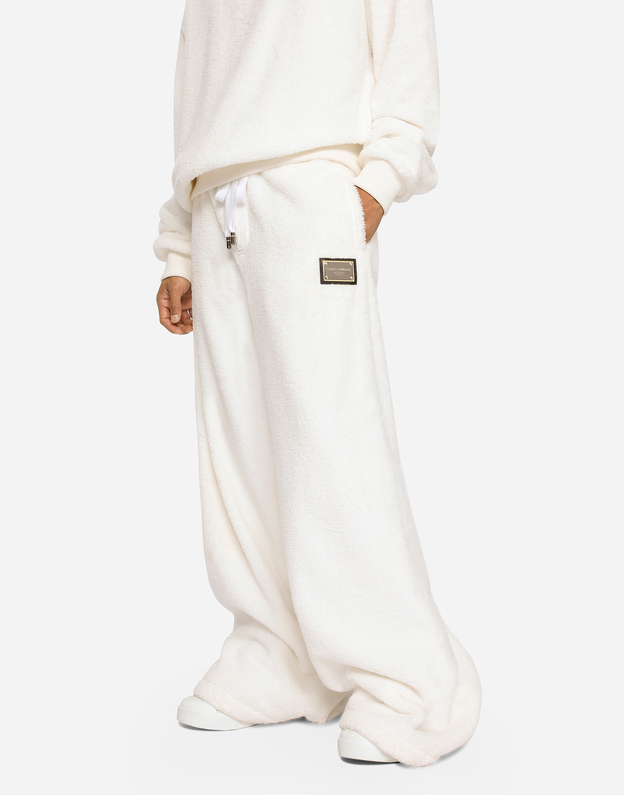 Shop Dolce & Gabbana Terrycloth Jogging Pants With Logo Tag In White
