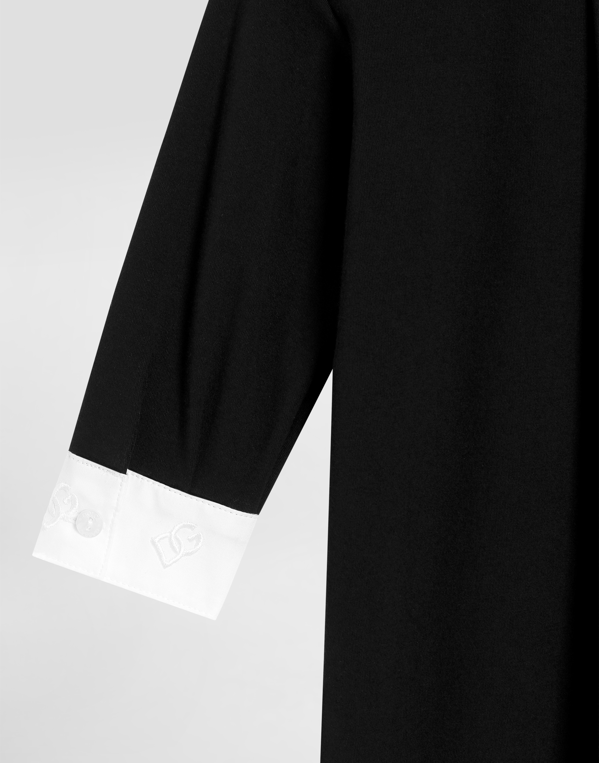 Interlock romper with embroidered bow tie